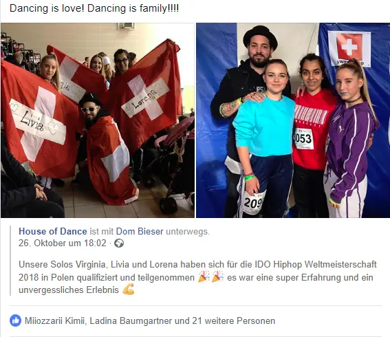 Mitglieder des House of Dance Teams mit Schweizer Flaggen und Teilnehmernummern bei der IDO HipHop Weltmeisterschaft 2018 in Polen, unterstützt von Coiffeur HAUPTSACHE